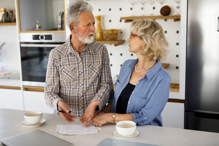 A couple discussing the benefits of maxing out their Roth IRA.